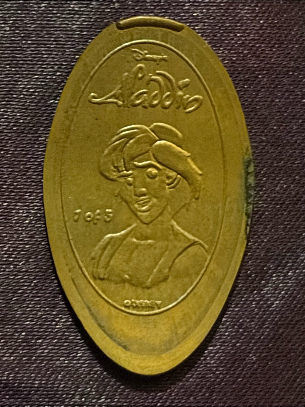 Walt Disney World Aladdin Embossed Souvenir Token Gold